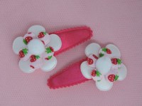 haarspeldje fuchsia met bloem